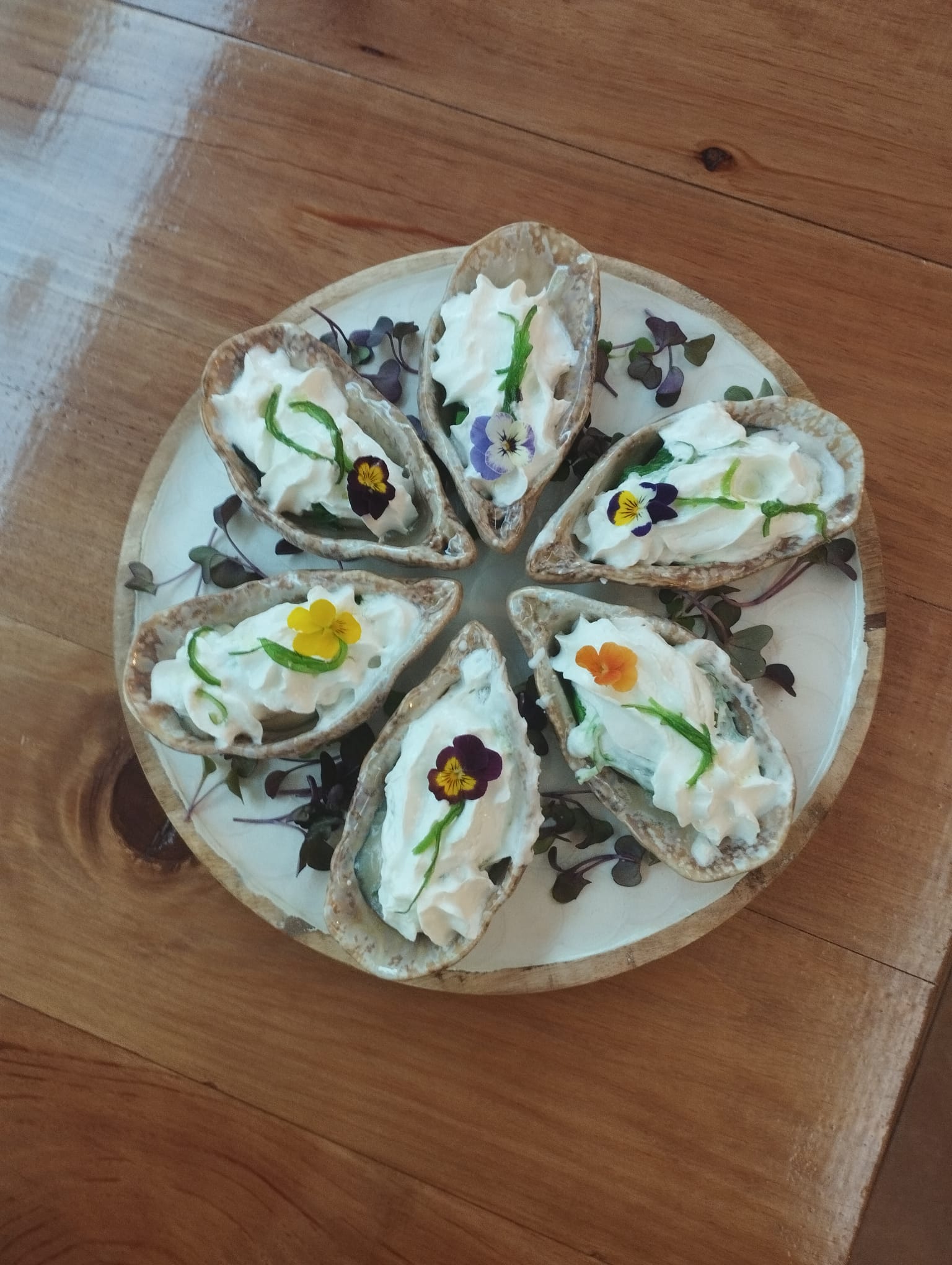 Ostra escalfada, emulsión limón y mar